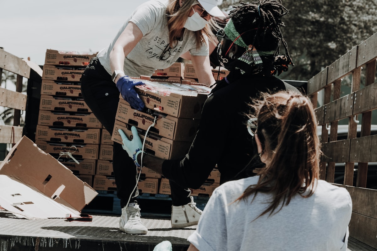 Volunteers preparing community donations together