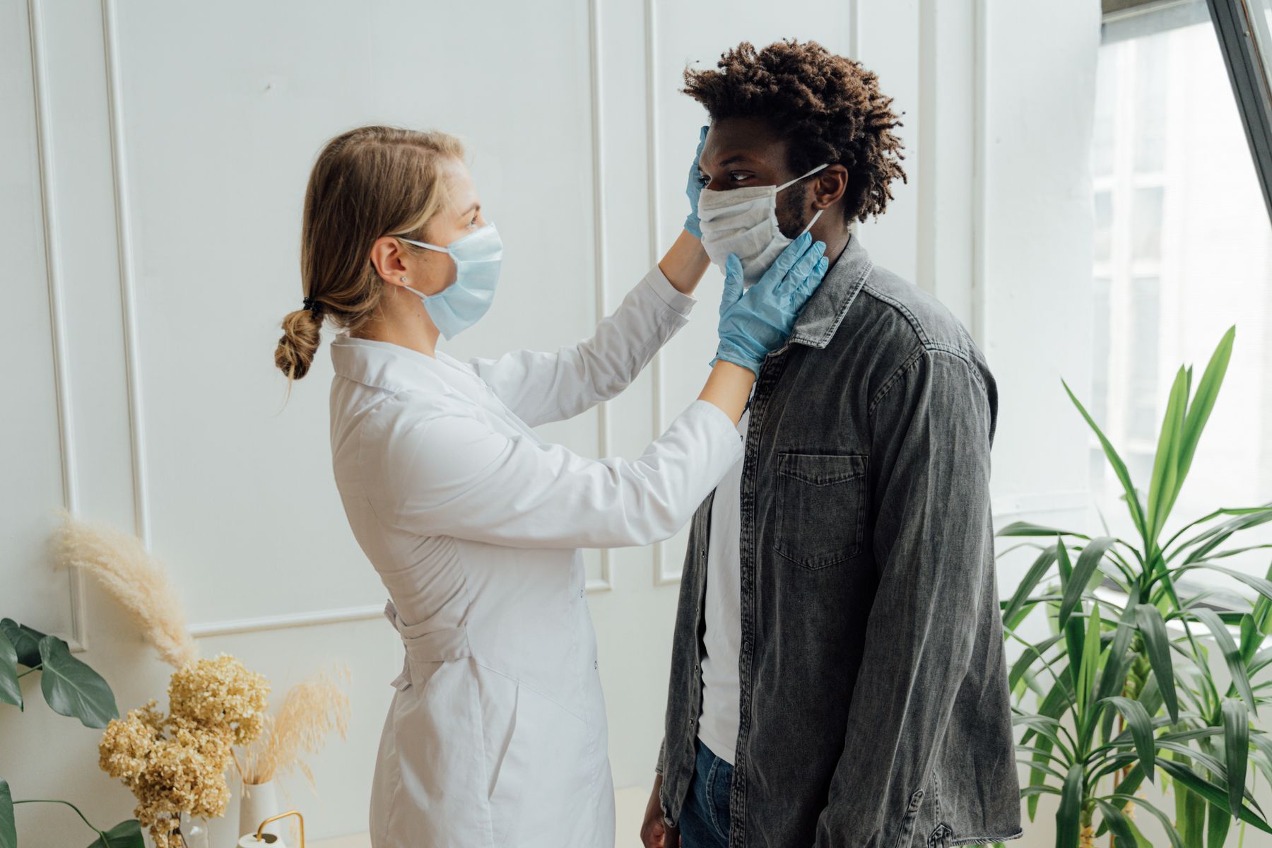 A medical professional carrying out a patient health check